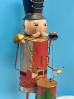 
              Painted Metal Nutcracker
            