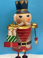 
              Painted Metal Nutcracker
            