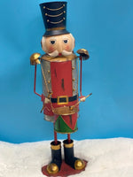 
              Painted Metal Nutcracker
            