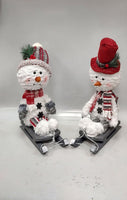 
              Sleigh Riding Bobble Head Snowmen
            