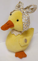 
              Plush Yellow Duck Decor
            