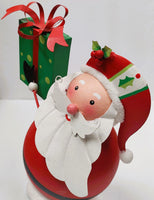 
              Handcrafted Santa Claus with Present
            