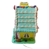 
              Light Up Pastel Easter Gingerbread House Decor
            